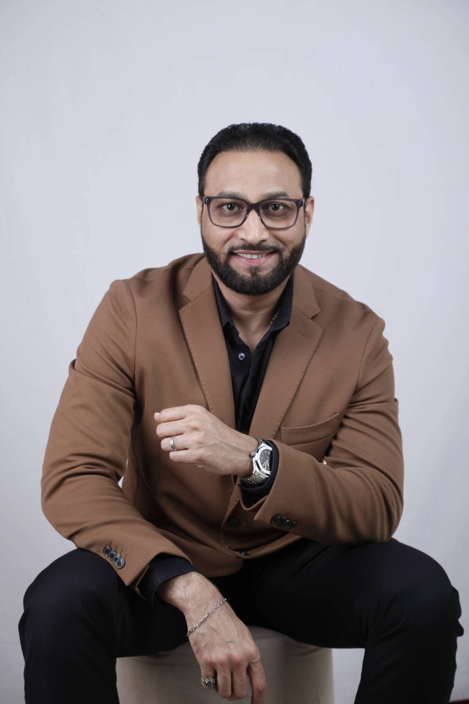 A portrait of the company owner smiling